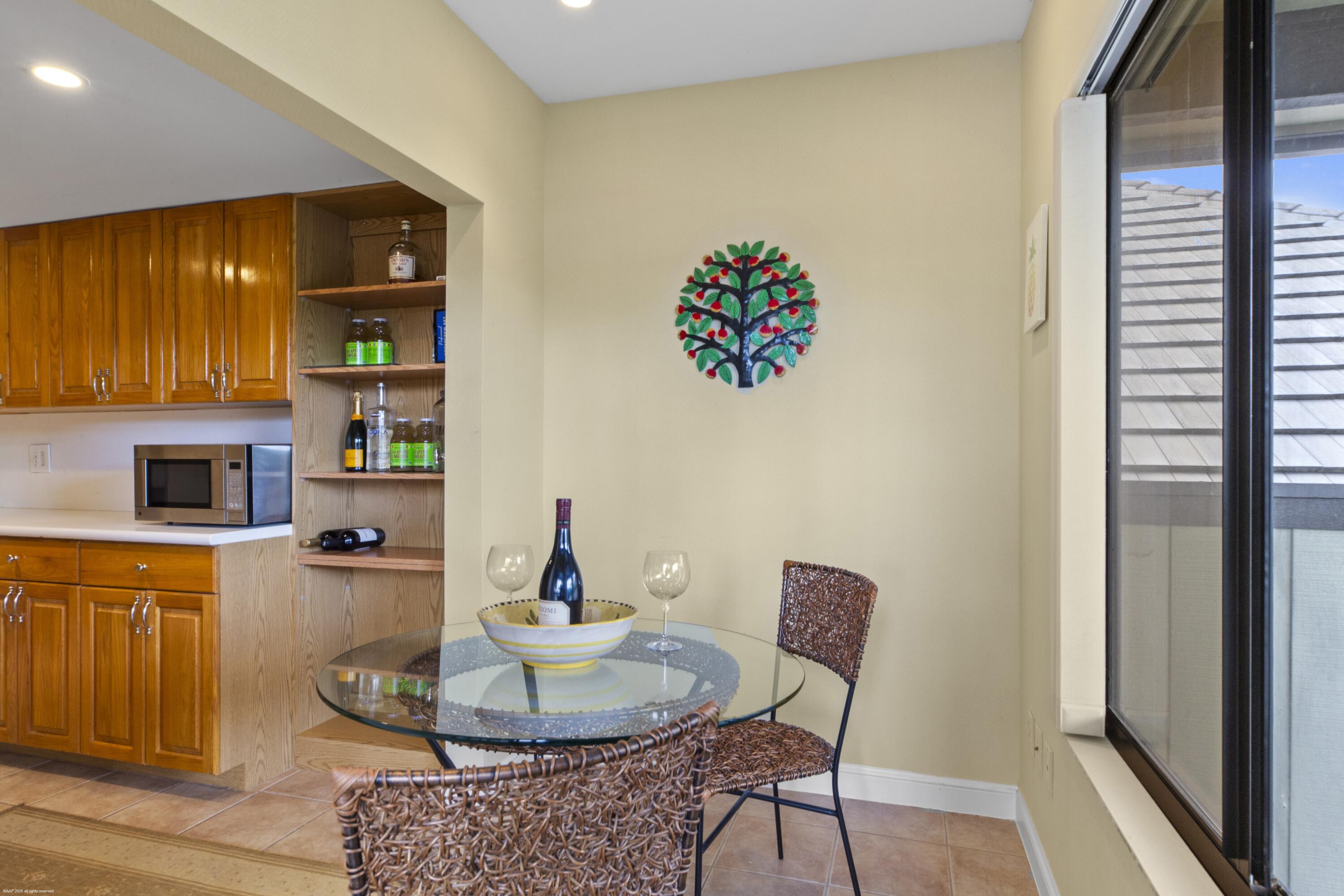 13244 Polo Club Road, Unit C206 Wellington, FL 33414 - Photo 8 of 46 a living room with furniture and a fireplace