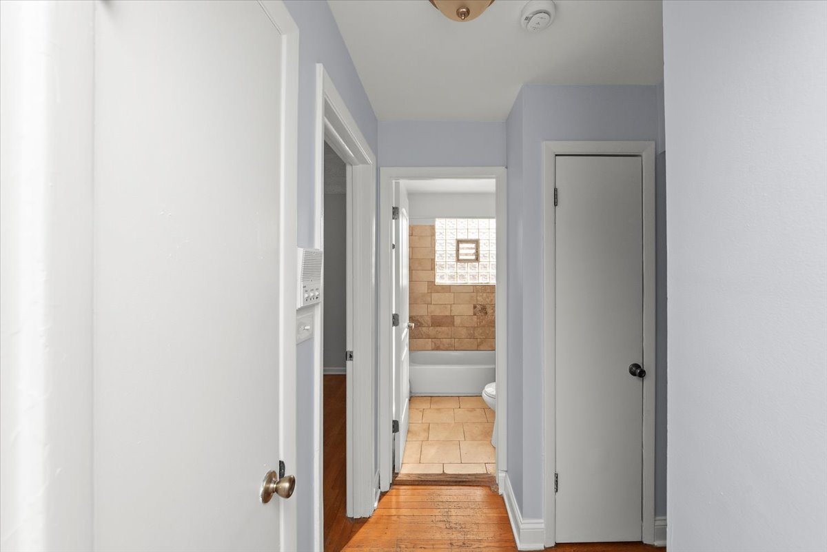 335 Custer Avenue, Unit 2S Evanston, IL 60202 - Photo 10 of 10 a view of a bathroom from a hallway