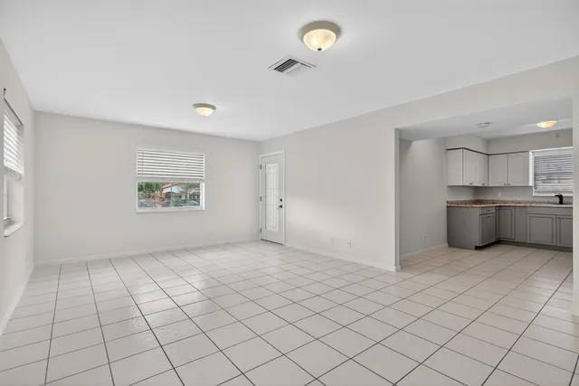 a view of an empty room and window