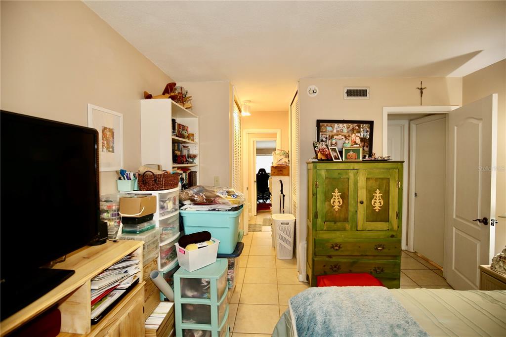 679 Melanie Lane Altamonte Springs, FL 32701 - Photo 15 of 23 a living room with furniture and a flat screen tv