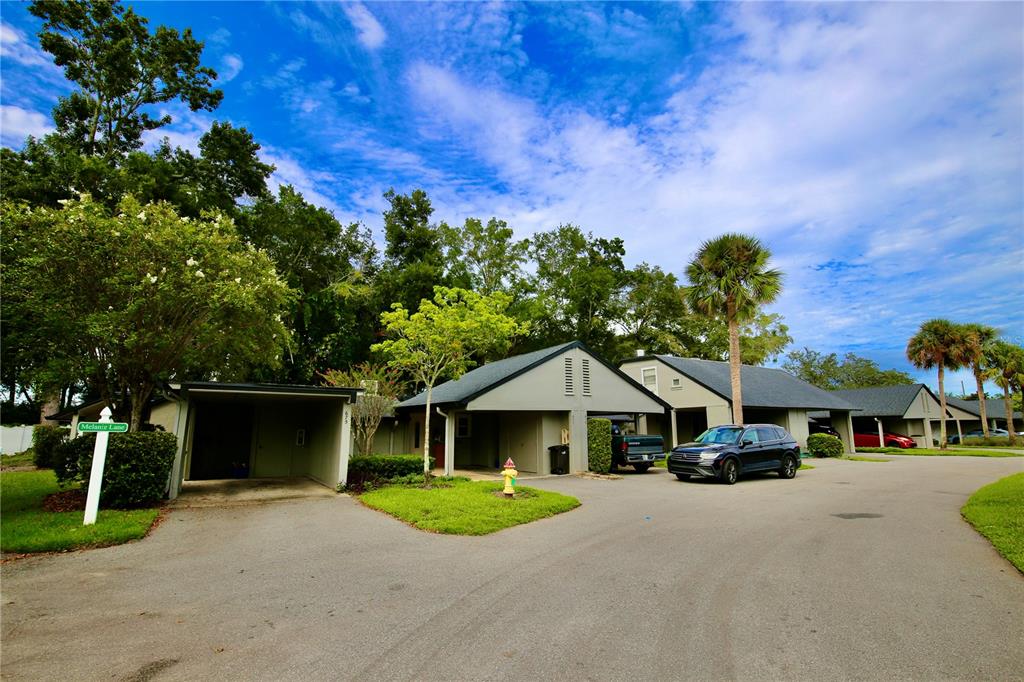 679 Melanie Lane Altamonte Springs, FL 32701 - Photo 22 of 23 front view of a house with a street
