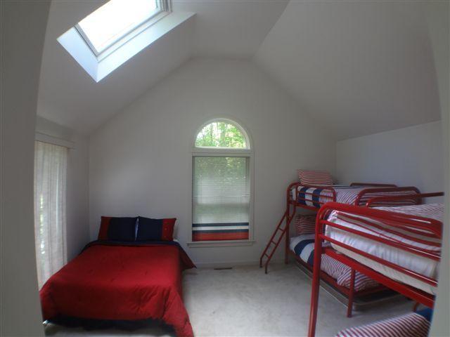 111 Fells Pond Road Mashpee, MA 02649 - Photo 5 of 15 a bedroom with bed and window