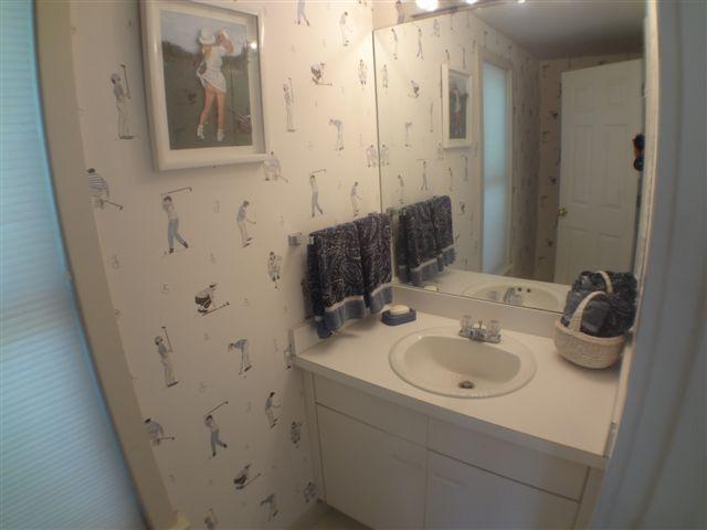 111 Fells Pond Road Mashpee, MA 02649 - Photo 8 of 15 a bathroom with a sink and a mirror