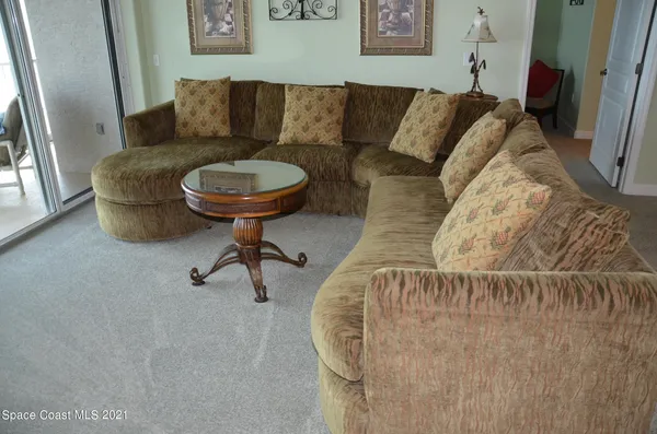 a living room with a couch and a coffee table