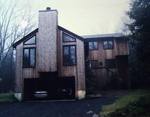 5 Deerfield Road Brookfield, CT 06804 - Photo 1 of 1 a brick house with a small yard and large trees