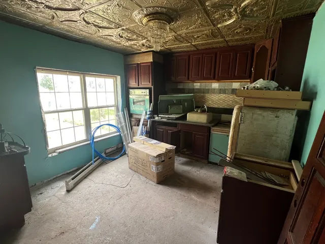 a room with furniture and a window