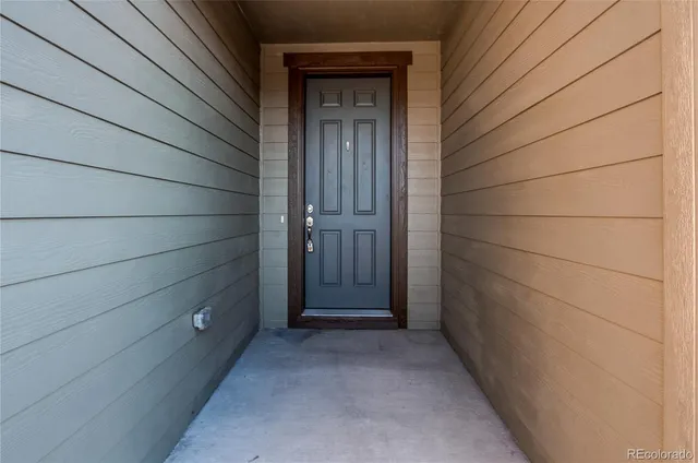 a large kitchen with stainless steel appliances granite countertop a large center island and a stove