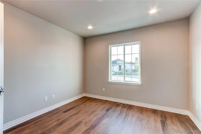 a bathroom with a sink toilet a mirror and shower