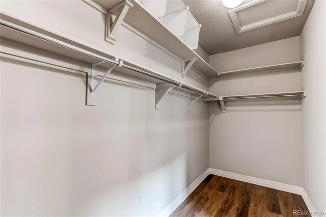 a bathroom that has a glass shower door