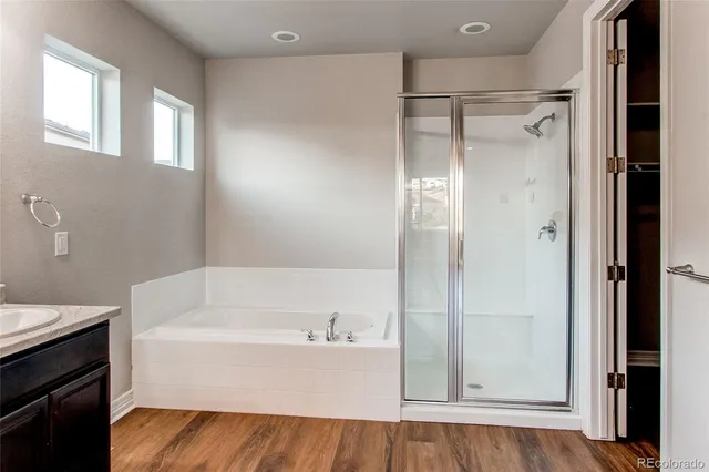 a view of staircase with wooden floor