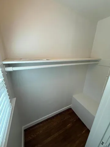 a view of small space with racks on the wall