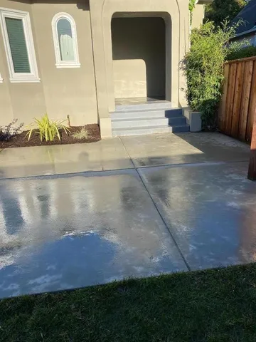 a view of a backyard of the house