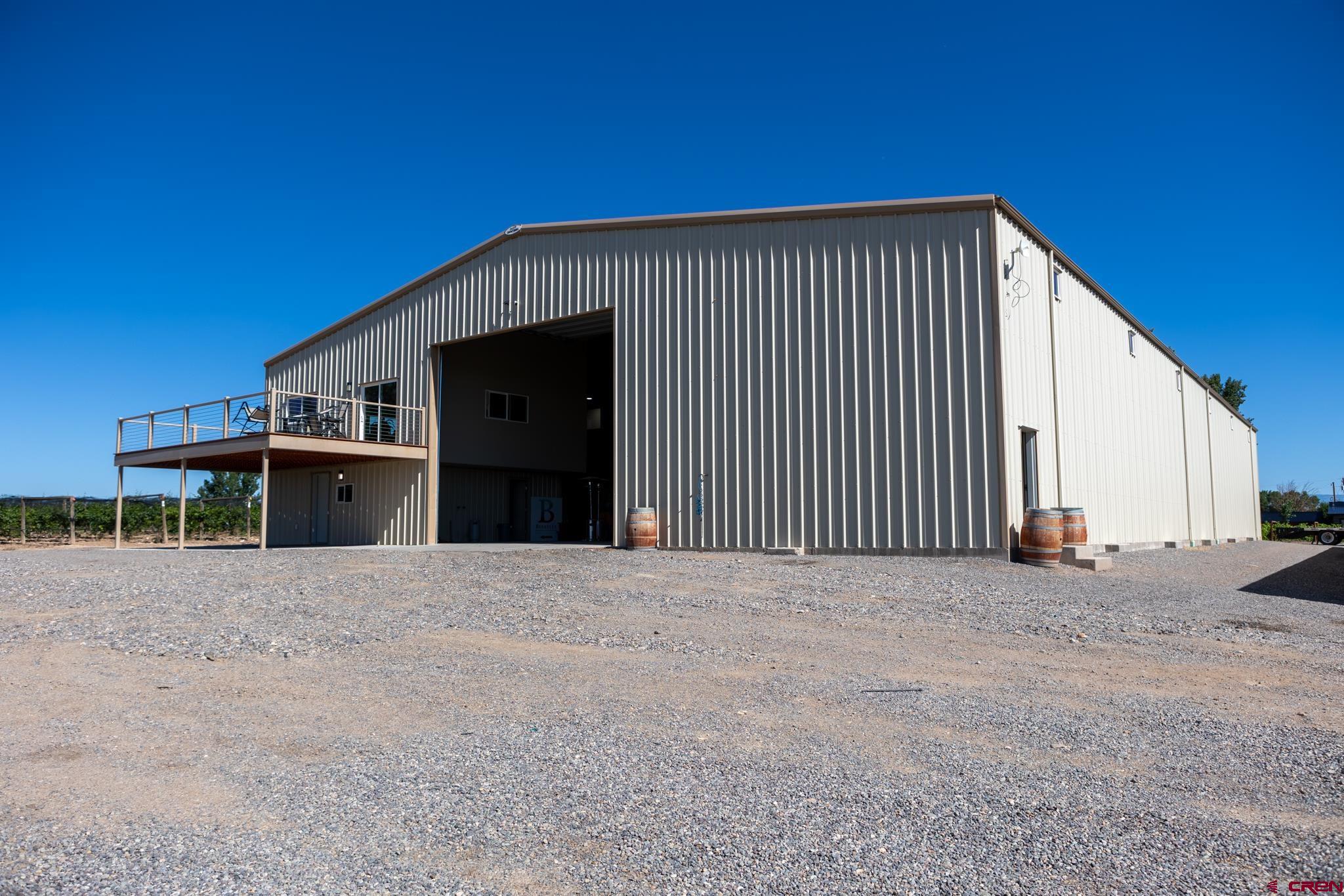 53582 Falcon Road Olathe, CO 81425 - Photo 15 of 35 a view of a house with a outdoor space
