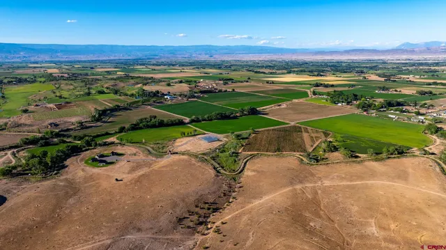 a view of a street with a yard