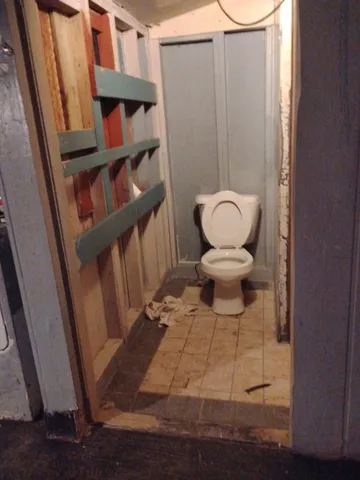 a front view of a house with outdoor