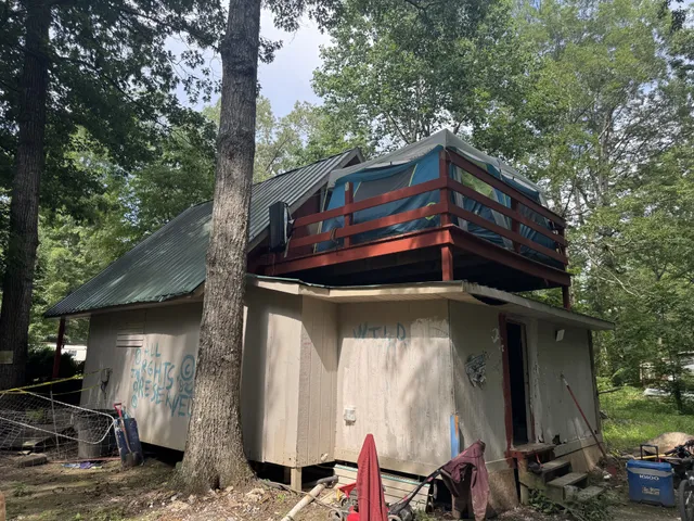 a car parked in front of a house