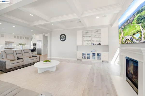 a bath tub sitting in a bathroom next to a window