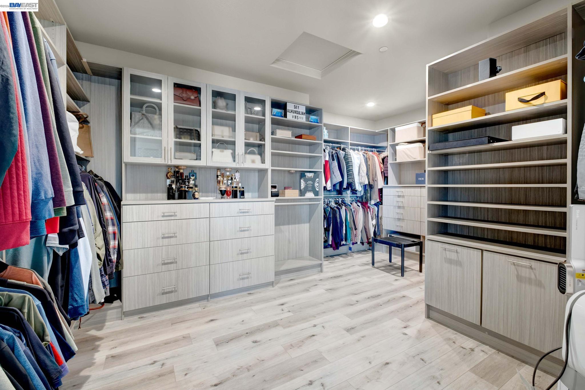 128 Dunfirth Drive Hayward, CA 94542 - Photo 19 of 60 a view of walk in closet with clothes and shoes