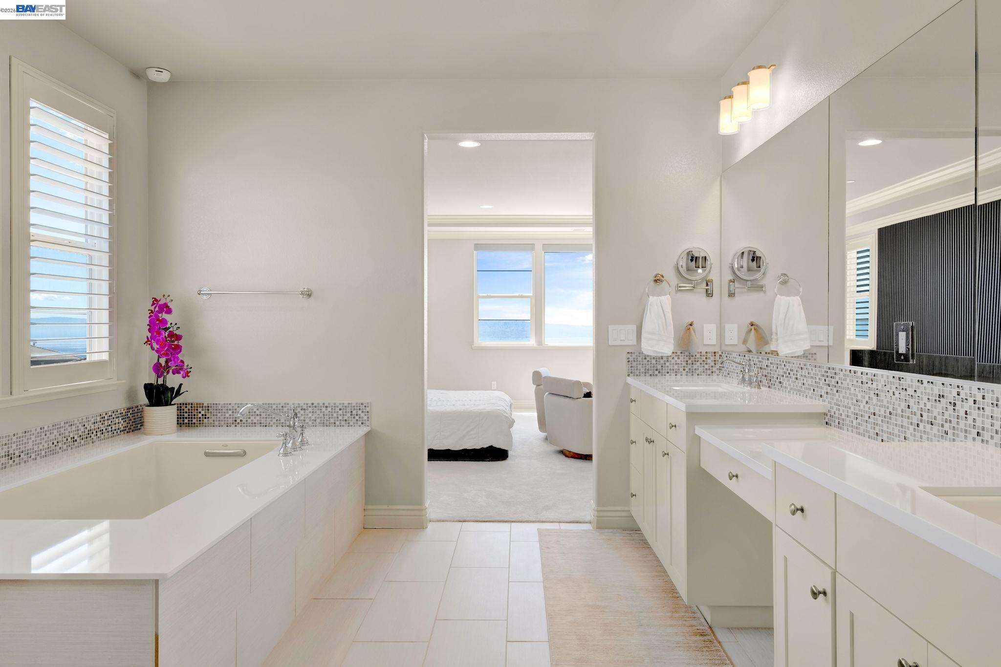 128 Dunfirth Drive Hayward, CA 94542 - Photo 20 of 60 a bathroom with a tub sink and a mirror