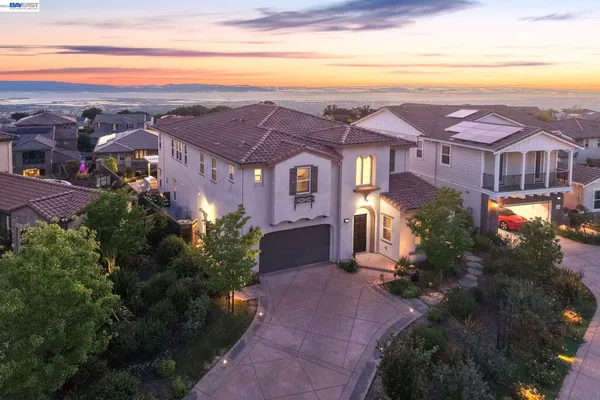 a view of a city with a building in front of it