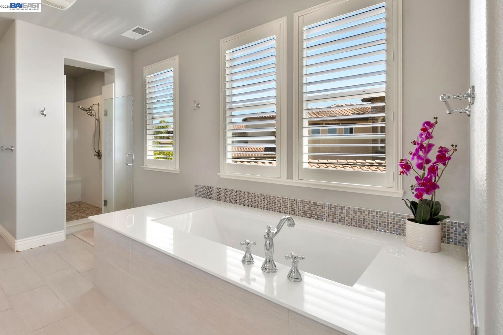 128 Dunfirth Drive Hayward, CA 94542 - Photo 21 of 60 a bath tub sitting in a bathroom next to a window