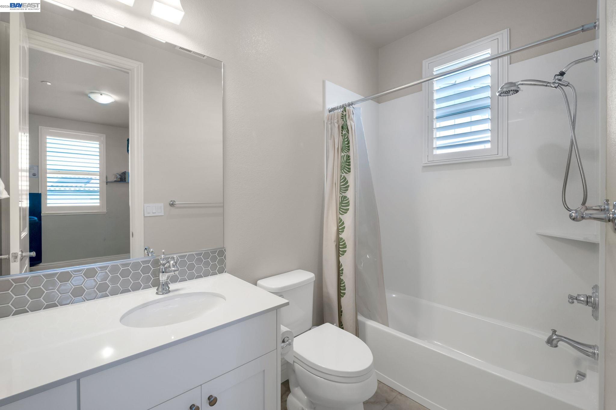 128 Dunfirth Drive Hayward, CA 94542 - Photo 29 of 60 a bathroom with a sink toilet and shower