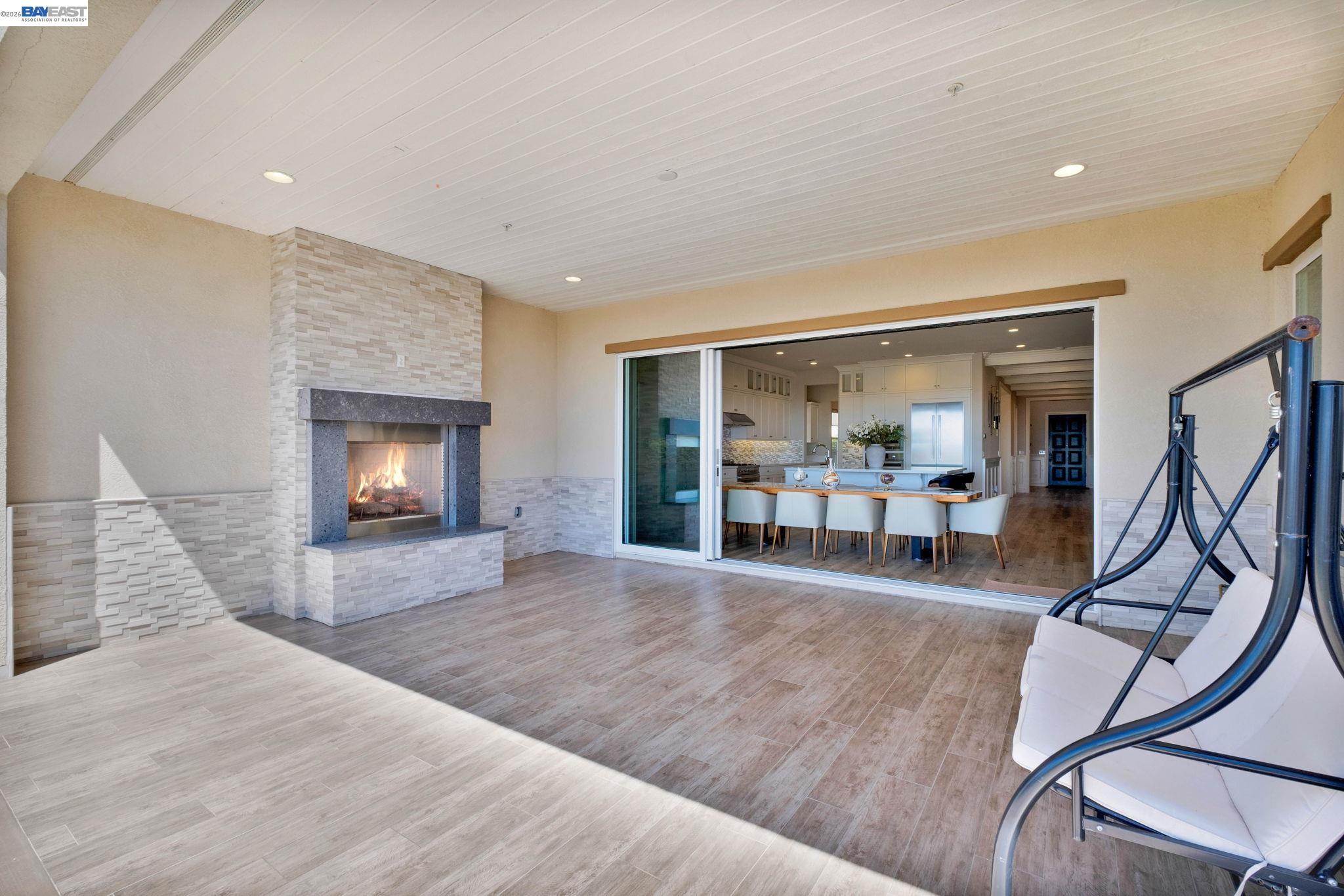 128 Dunfirth Drive Hayward, CA 94542 - Photo 34 of 60 a view of a livingroom with wooden floor and a fireplace