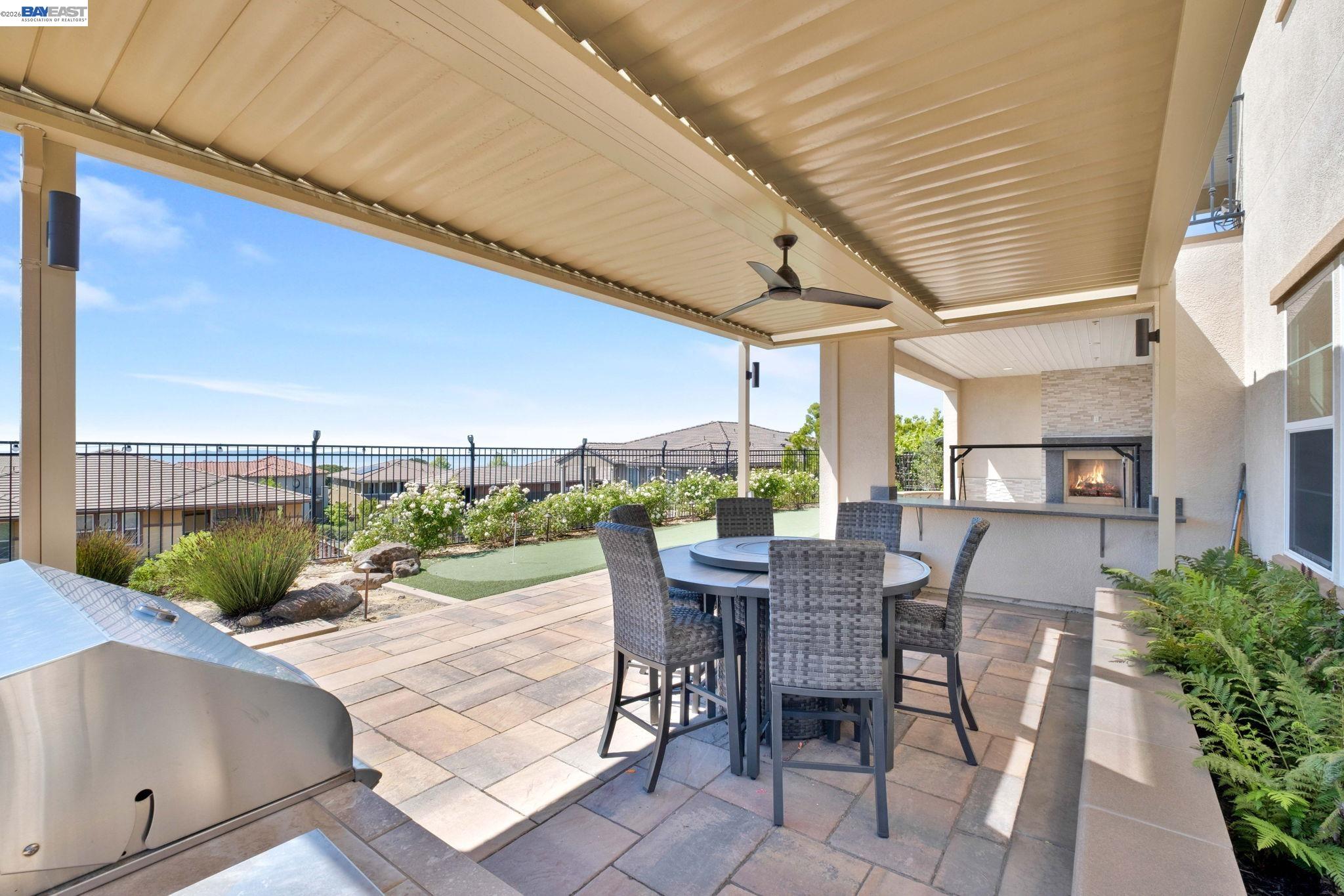 128 Dunfirth Drive Hayward, CA 94542 - Photo 41 of 60 a view of a patio with couches table and chairs and potted plants
