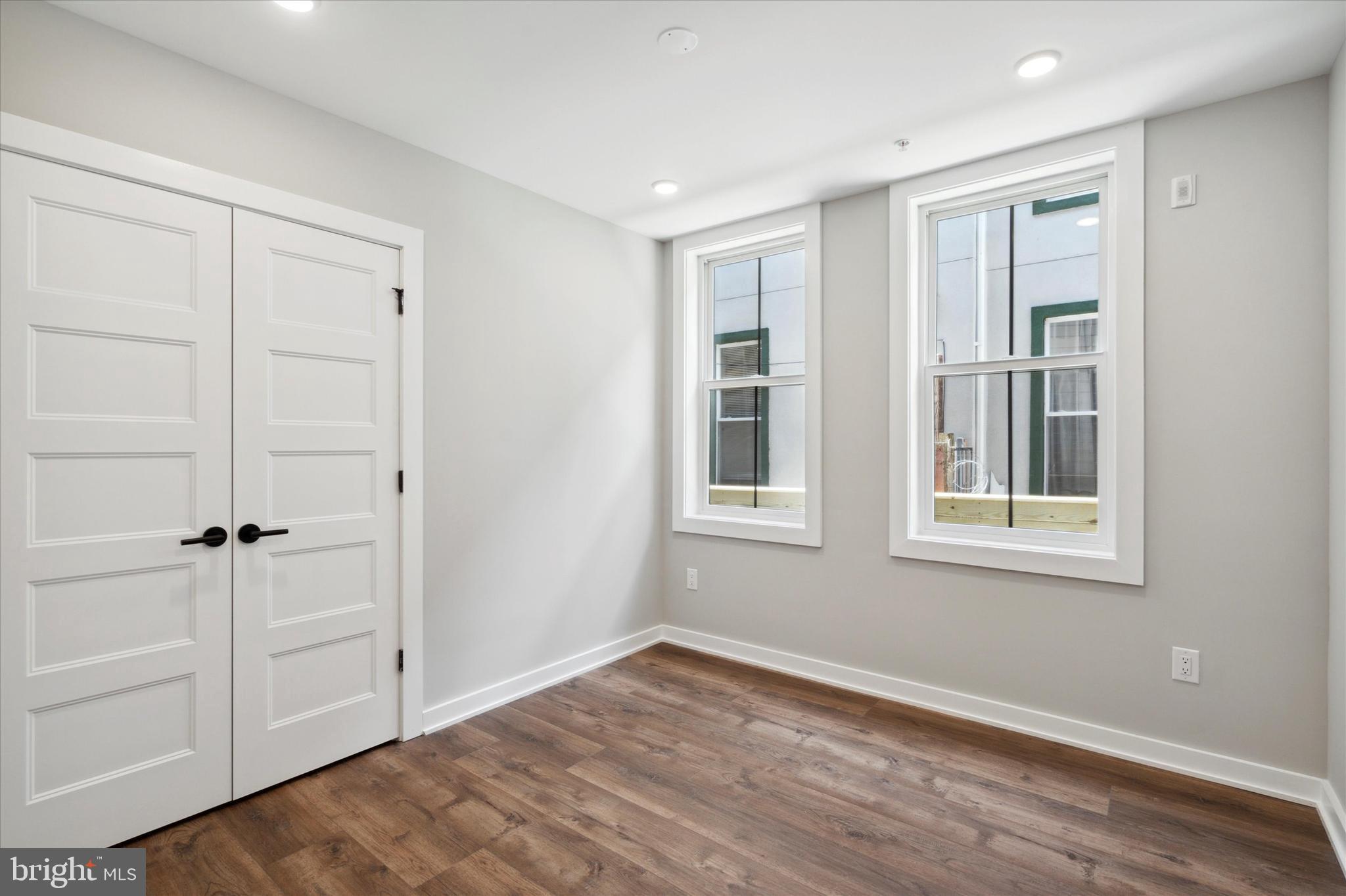 3519 Hamilton Street, Unit B Philadelphia, PA 19104 - Photo 11 of 16 a view of an empty room with a window and closet area