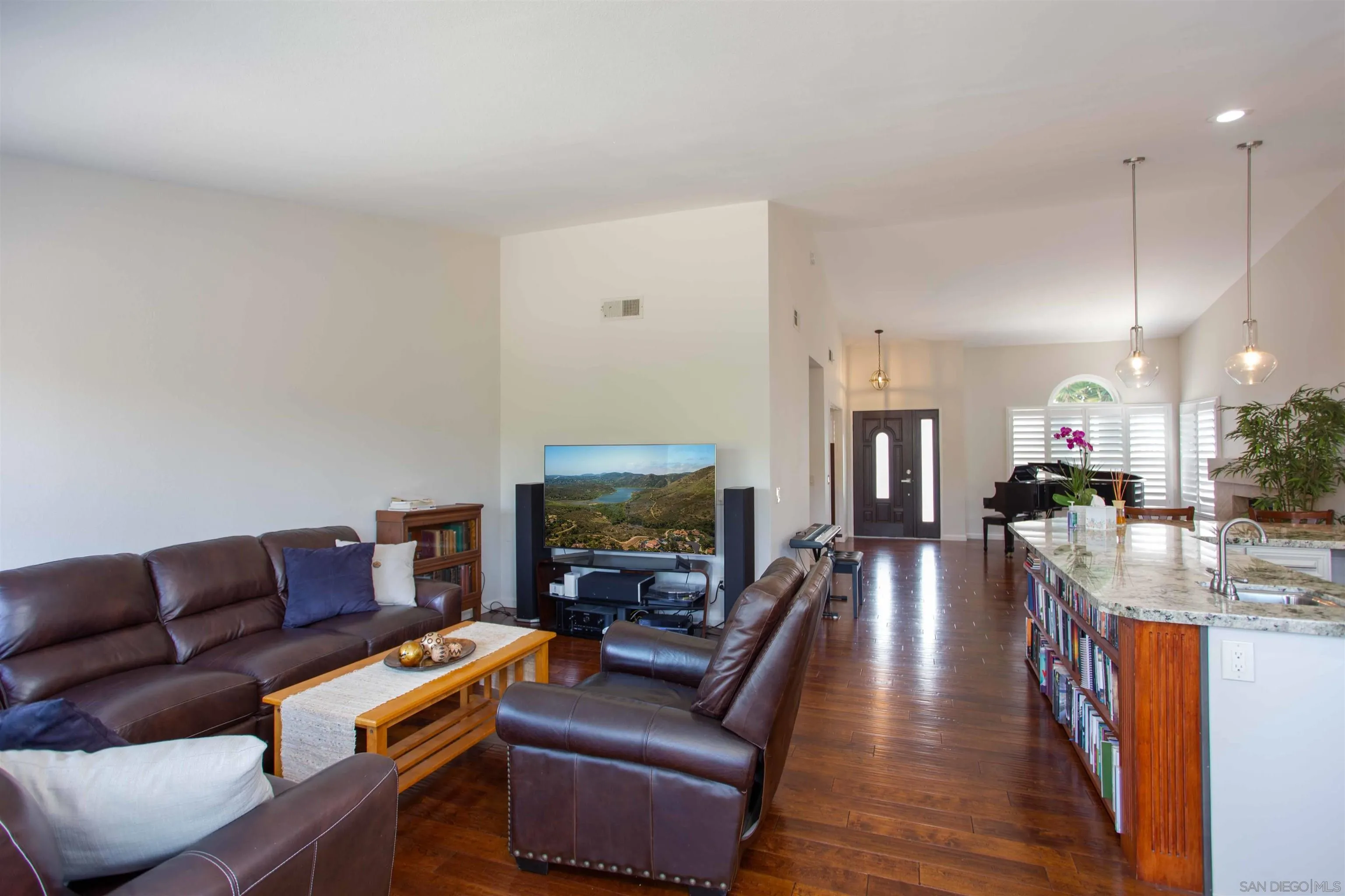 9182 Emden Road San Diego, CA 92129 - Photo 12 of 27 a living room with furniture and a fireplace