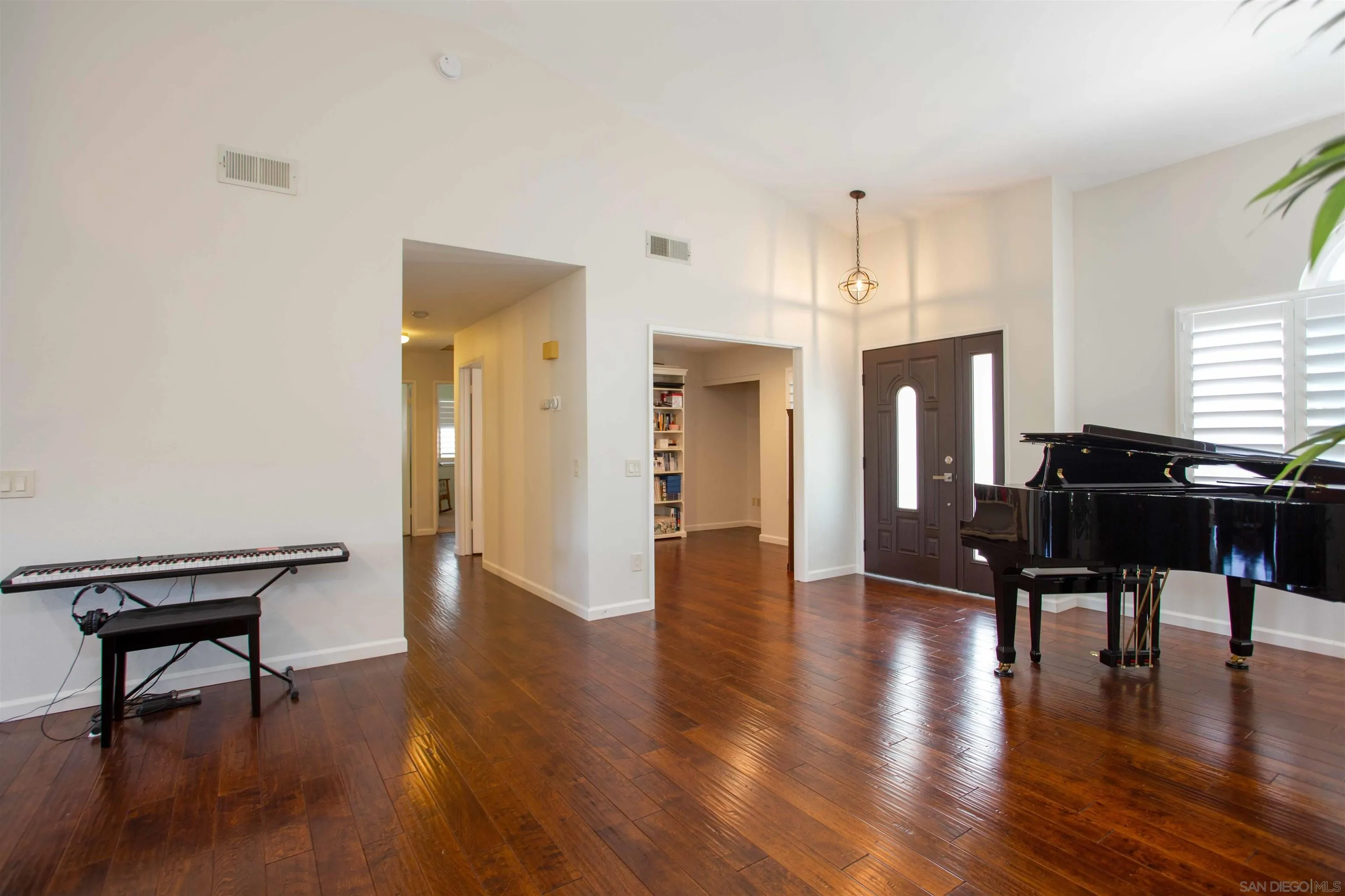 9182 Emden Road San Diego, CA 92129 - Photo 13 of 27 a view of a livingroom with furniture and a piano