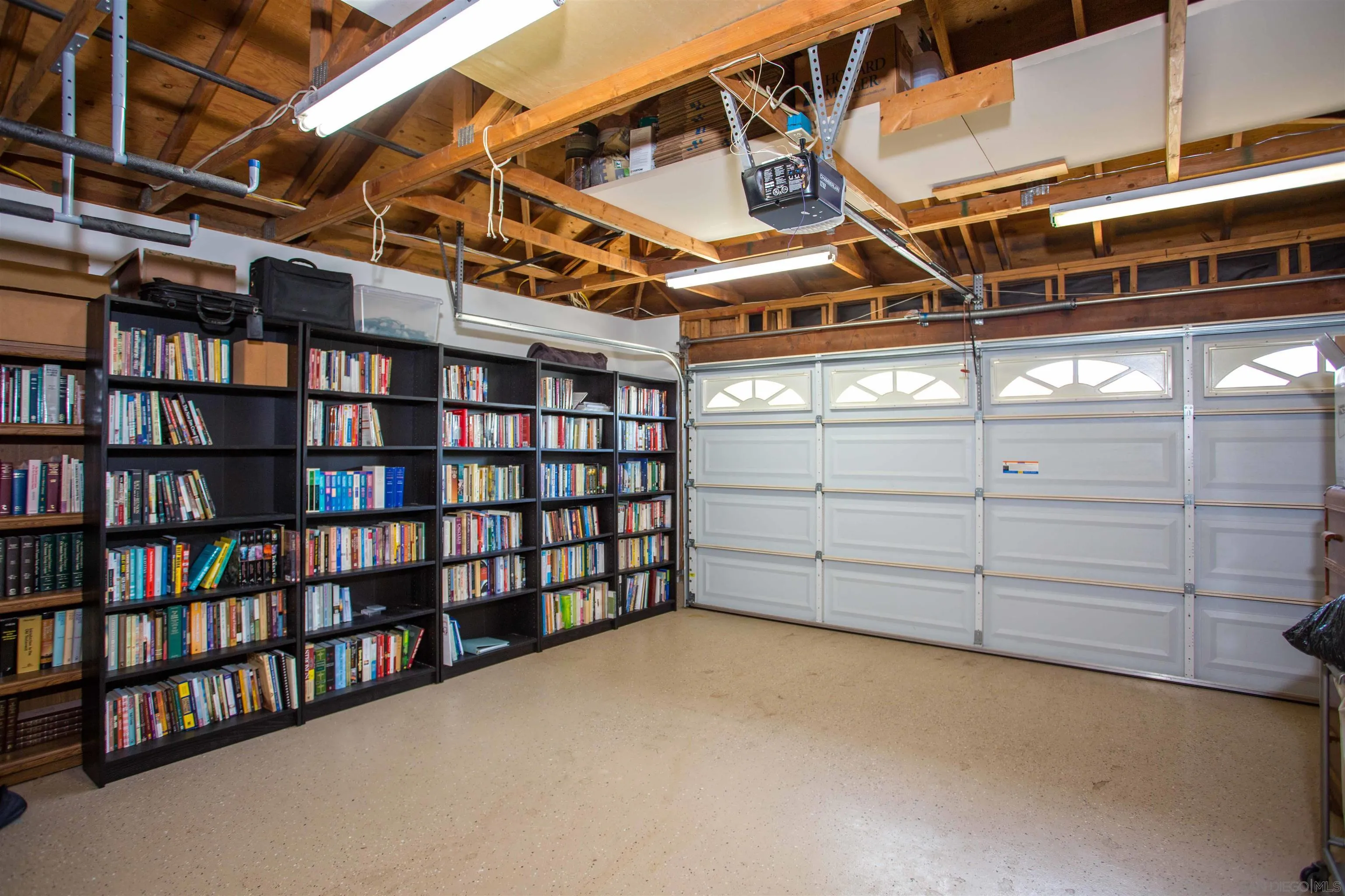 9182 Emden Road San Diego, CA 92129 - Photo 23 of 27 a view of a room with racks on the wall