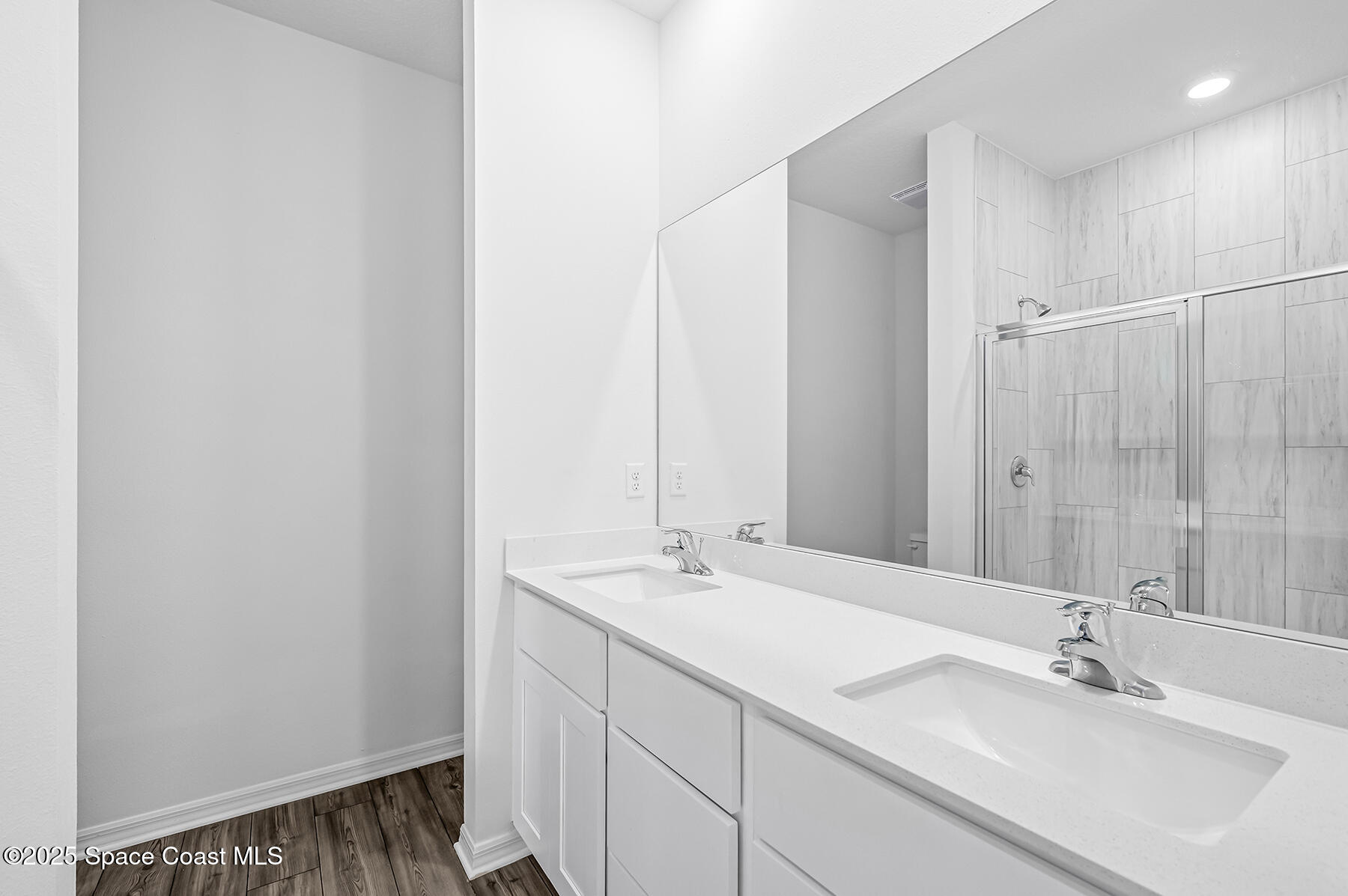 435 Olney Street Palm Bay, FL 32908 - Photo 12 of 18 a bathroom with a sink and a mirror