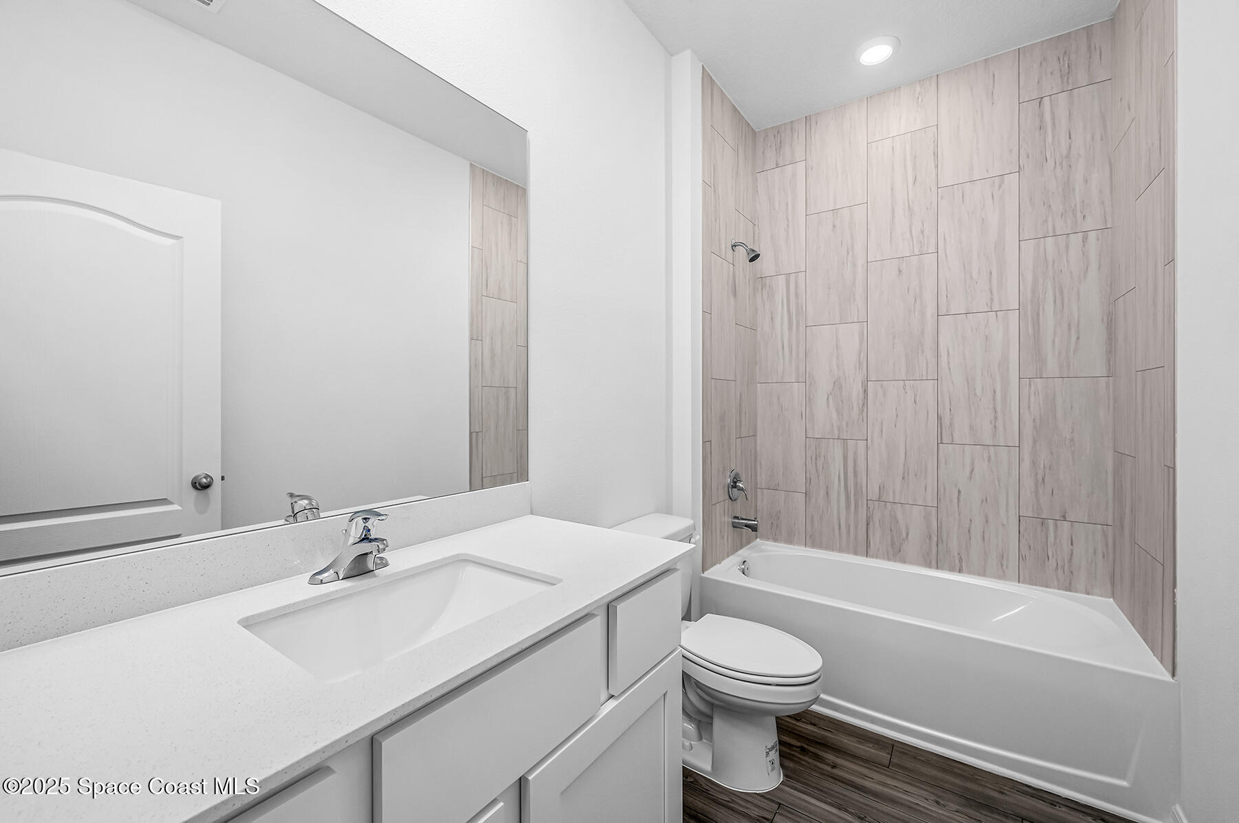 435 Olney Street Palm Bay, FL 32908 - Photo 18 of 18 a bathroom with a sink a toilet and a bathtub