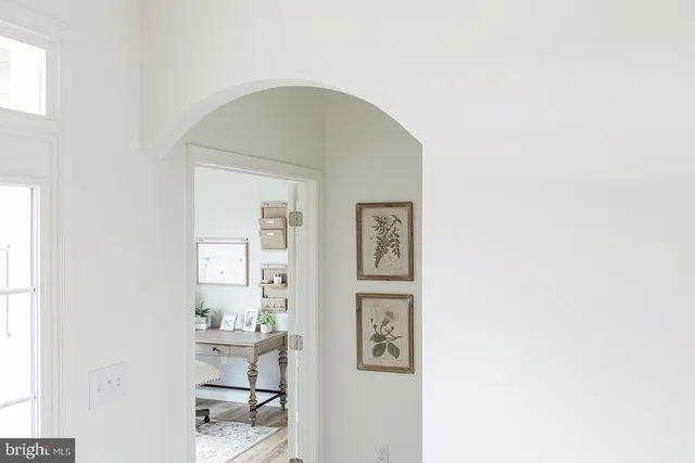 a living room with a wooden floor