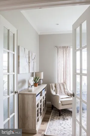 a workspace with furniture and window