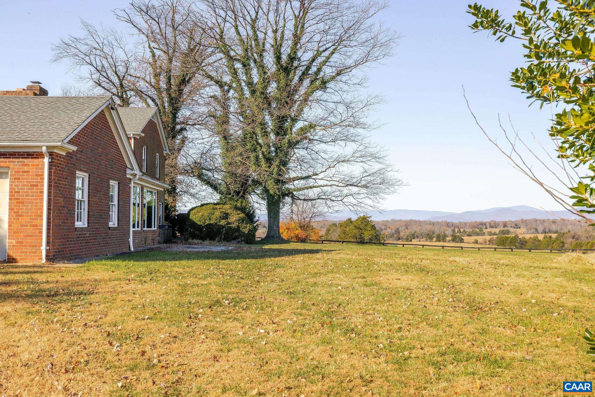 3260 Earlysville Road Earlysville, VA 22936 - Photo 13 of 42 a view of a patio with a yard