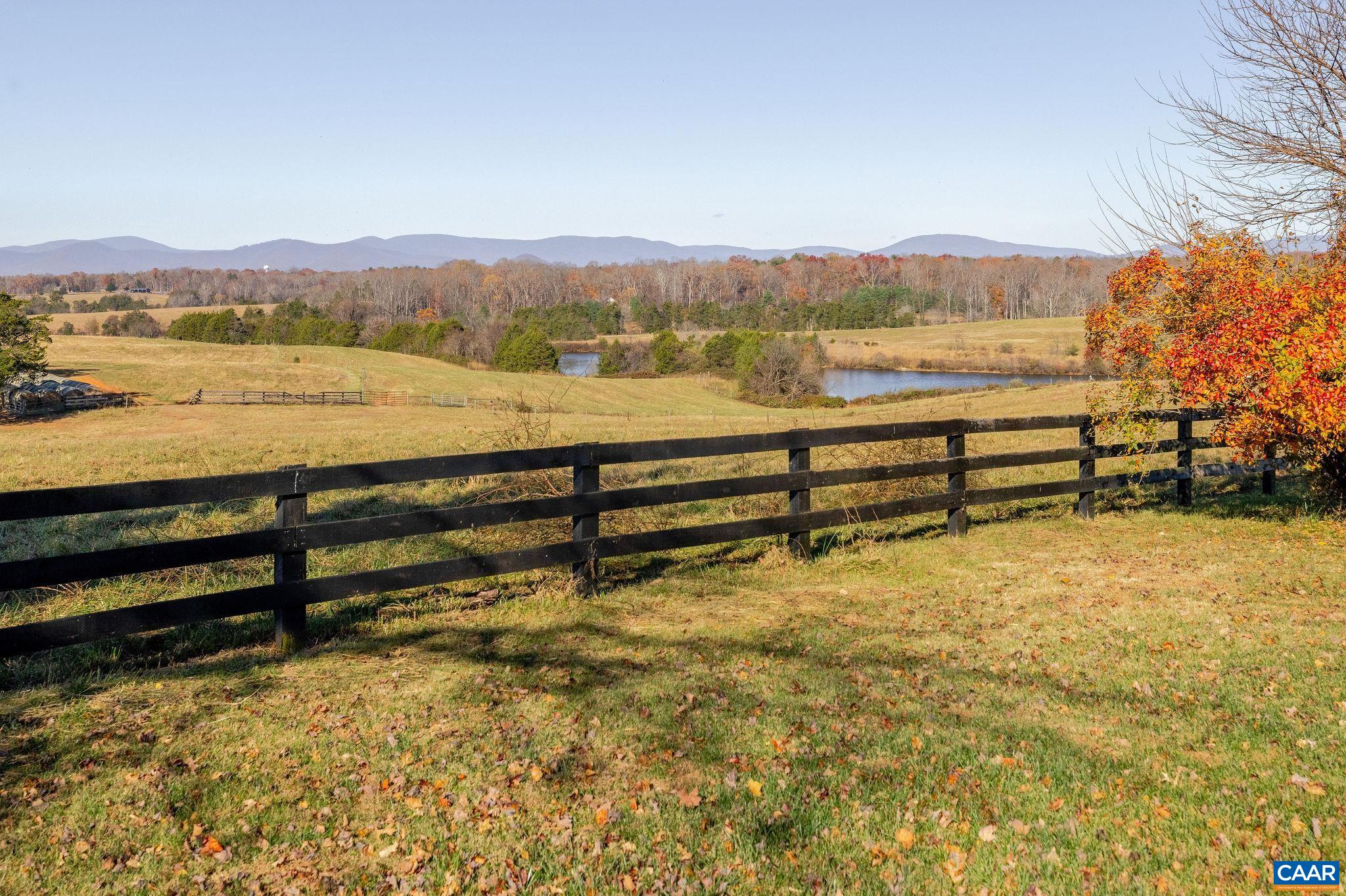 3260 Earlysville Road Earlysville, VA 22936 - Photo 17 of 42 a view of an ocean with a mountain