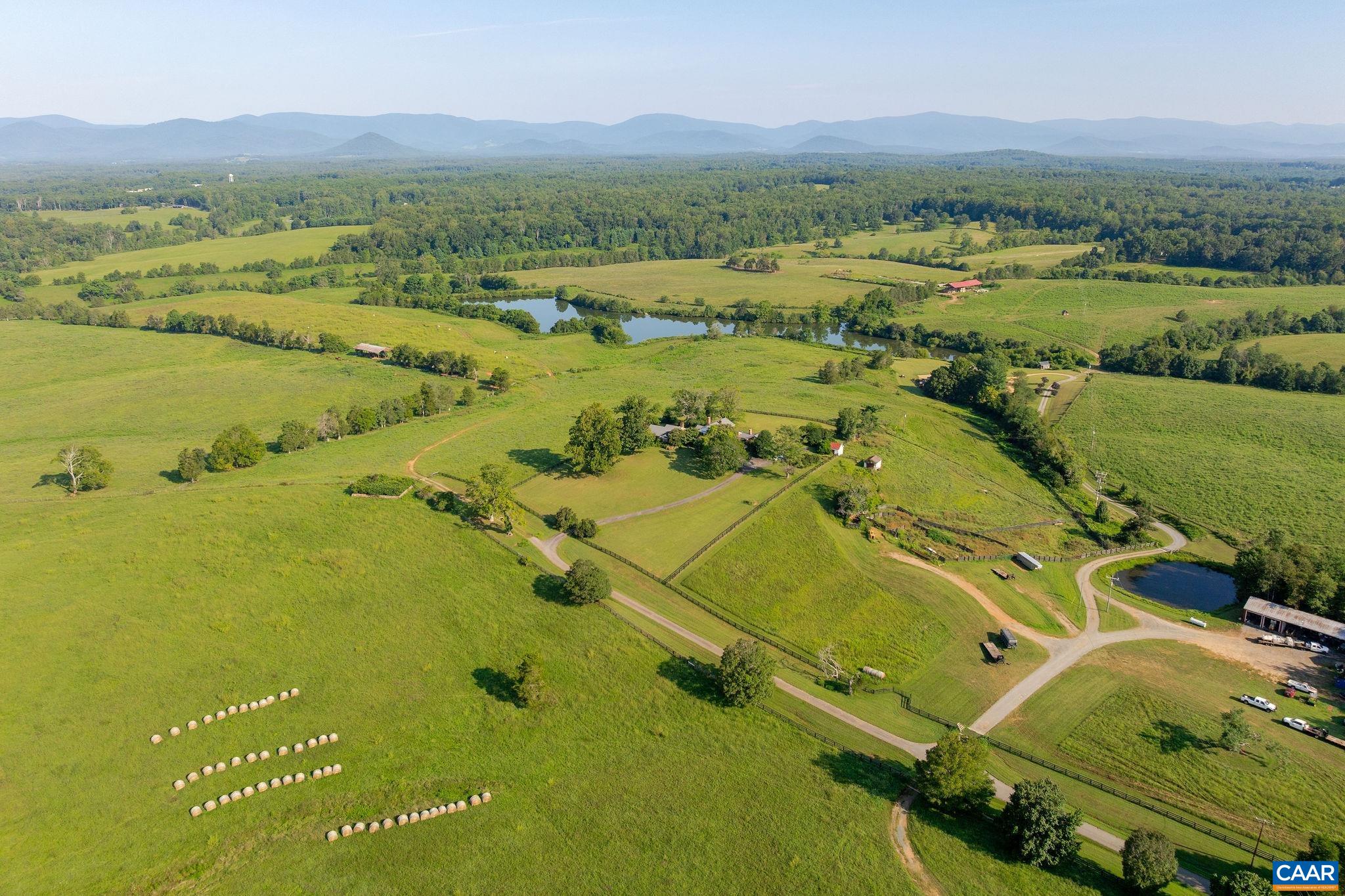 3260 Earlysville Road Earlysville, VA 22936 - Photo 27 of 42 an aerial view of residential houses with outdoor space and river