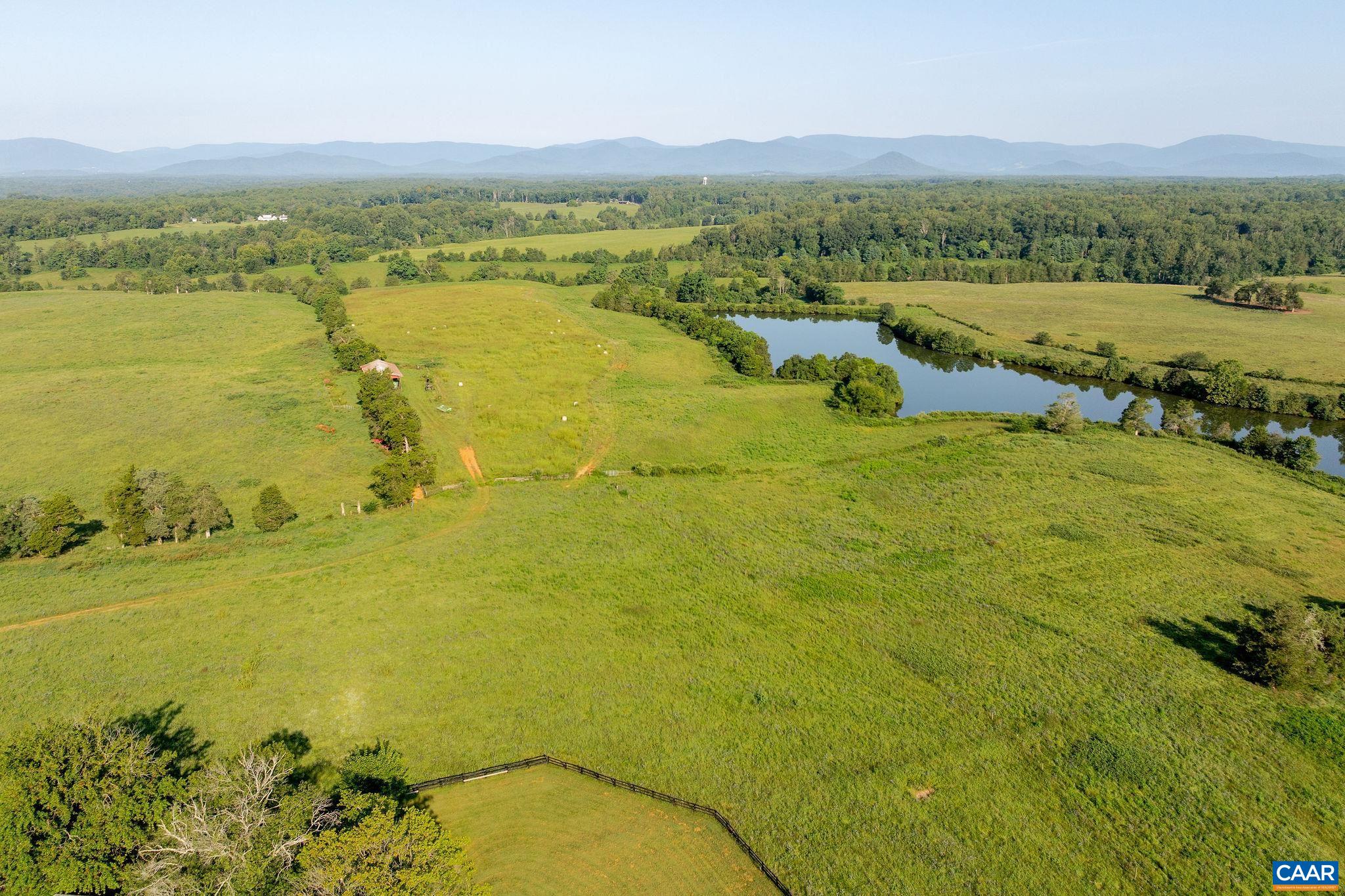 3260 Earlysville Road Earlysville, VA 22936 - Photo 31 of 42 a view of an ocean and a mountain