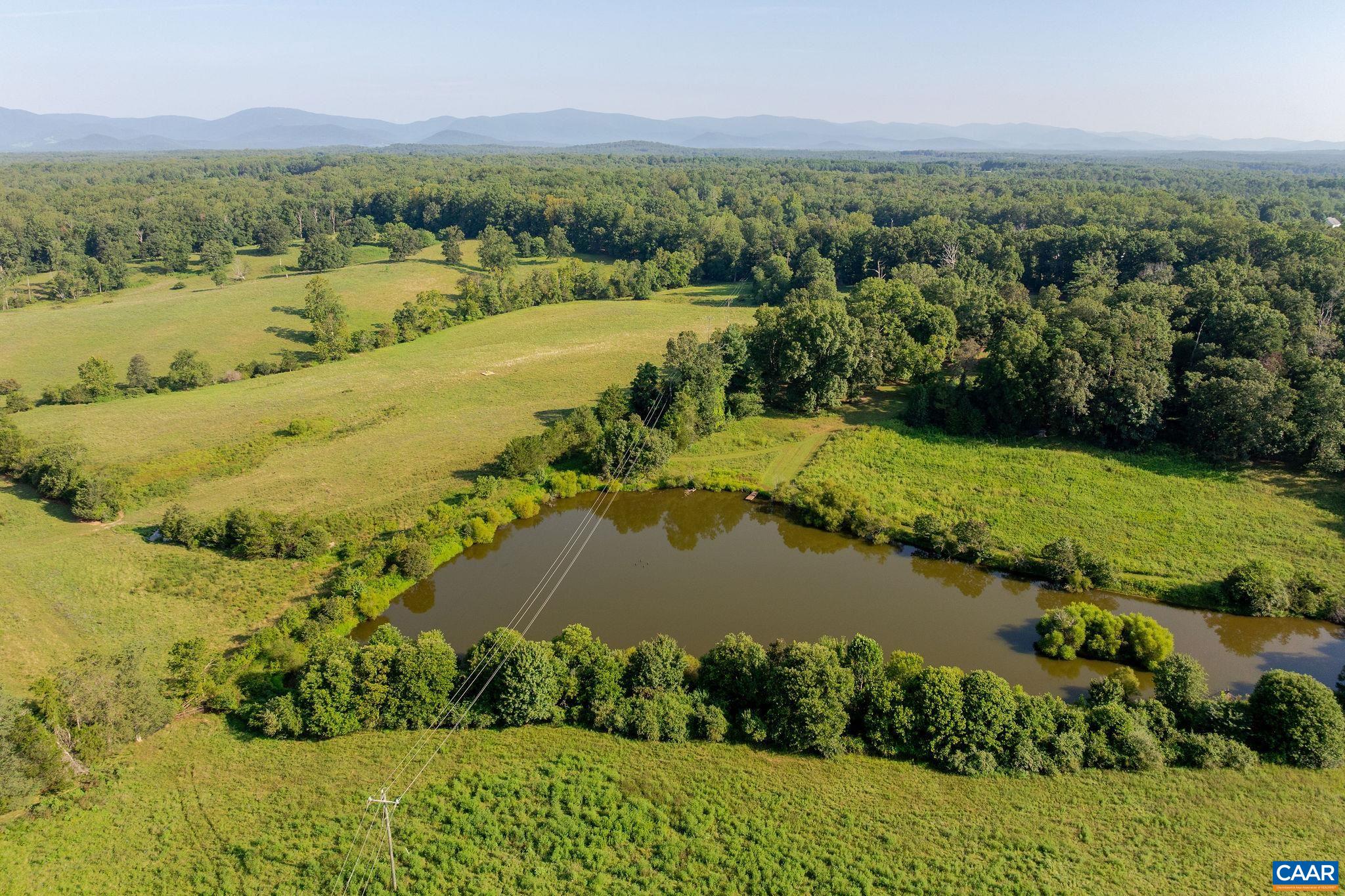3260 Earlysville Road Earlysville, VA 22936 - Photo 35 of 42 a view of a city with a lake