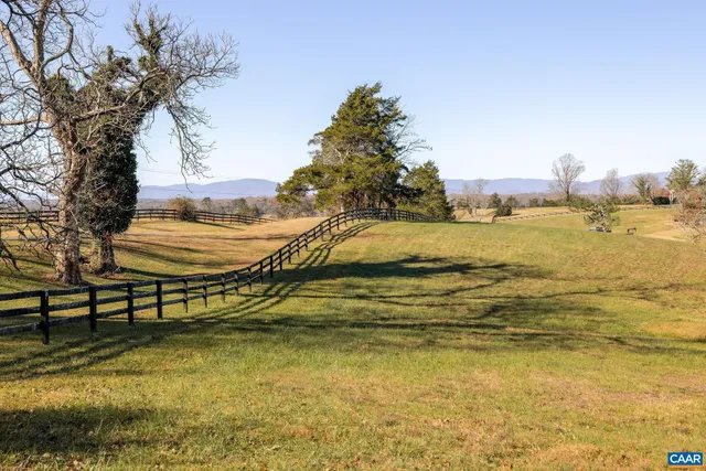 a view of an ocean and a mountain