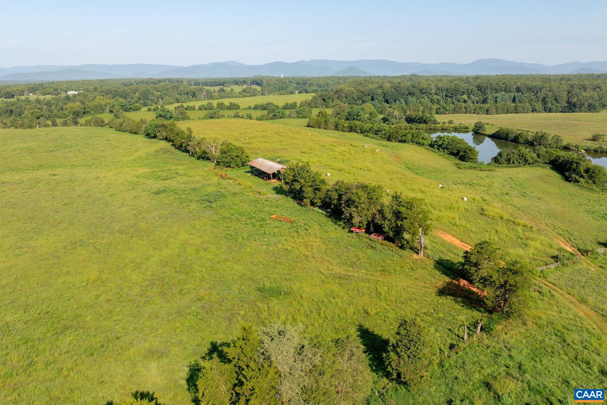 3260 Earlysville Road Earlysville, VA 22936 - Photo 42 of 42 a view of an ocean and a mountain