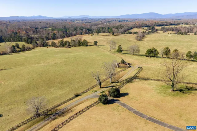 a view of a patio with a yard