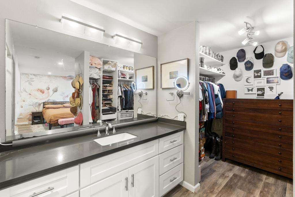 18027 Cotorro Road San Diego, CA 92128 - Photo 20 of 31 a view of a walk in closet