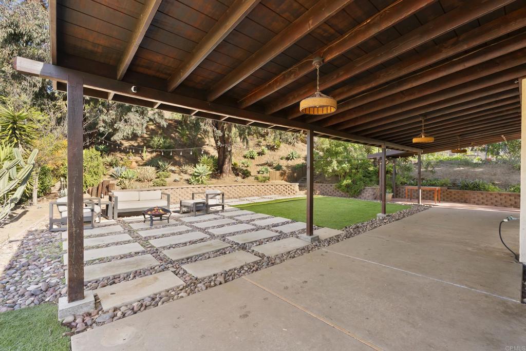 18027 Cotorro Road San Diego, CA 92128 - Photo 23 of 31 a view of a backyard of a house