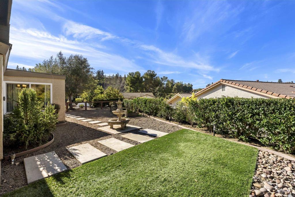 18027 Cotorro Road San Diego, CA 92128 - Photo 27 of 31 a view of a back yard