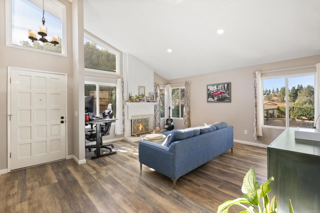 18027 Cotorro Road San Diego, CA 92128 - Photo 3 of 31 a living room with furniture and a window