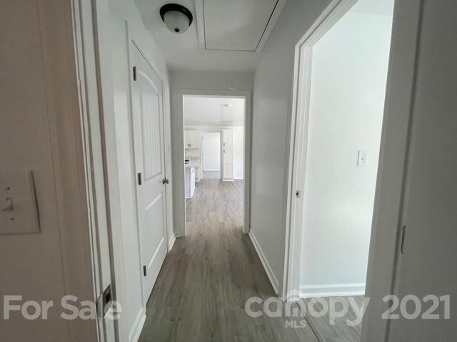 315 South Ransom Street Gastonia, NC 28052 - Photo 13 of 20 a view of a hallway with wooden floor