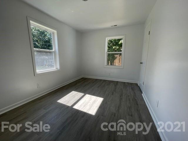 315 South Ransom Street Gastonia, NC 28052 - Photo 15 of 20 an empty room with windows